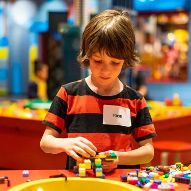 Kid playing legos