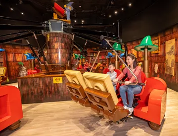Merlin's Apprentice ride at Legoland Discovery Centre Hong Kong, capturing the enchanting atmosphere of the ride's magical potions chamber.