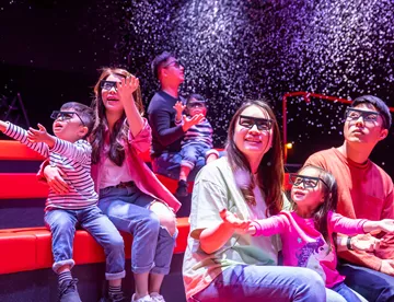 Parents and kids are immersed in a 4D experience in the LEGO® 4D STUDIO