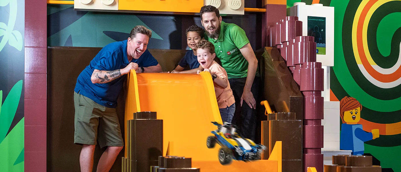 LEGOLAND Discovery Center's Endless Annual Pass Sale, featuring happy kids building with LEGO bricks and bright, playful graphics